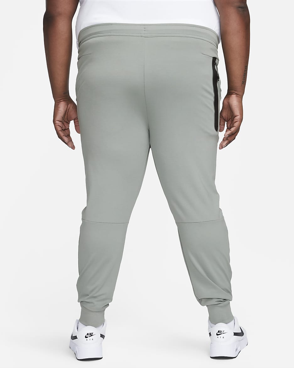 Nike gray slim fit tech sweatpants online